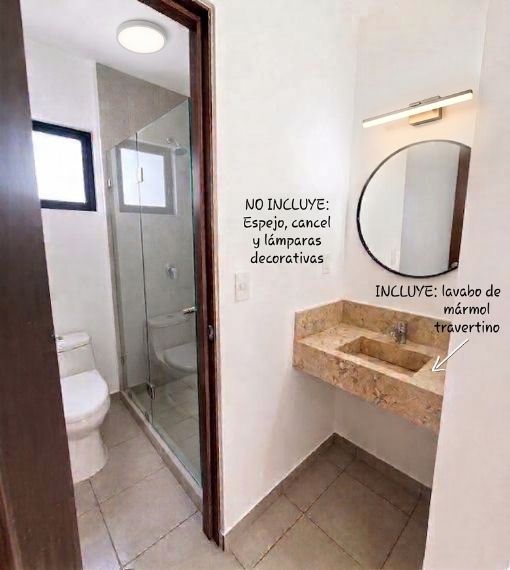 Baño con lavabo de mármol travertino del modelo Arya en Aronah Alba, León Gto
